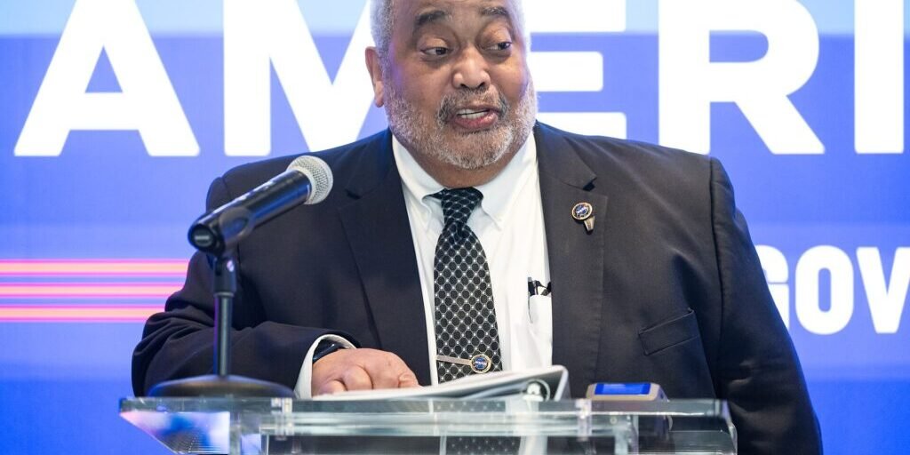 A speaker at a government small business event