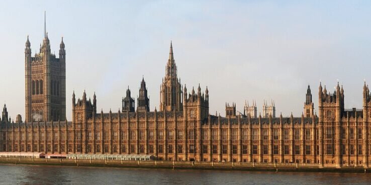 The Palace of Westminster reflected in the Thames